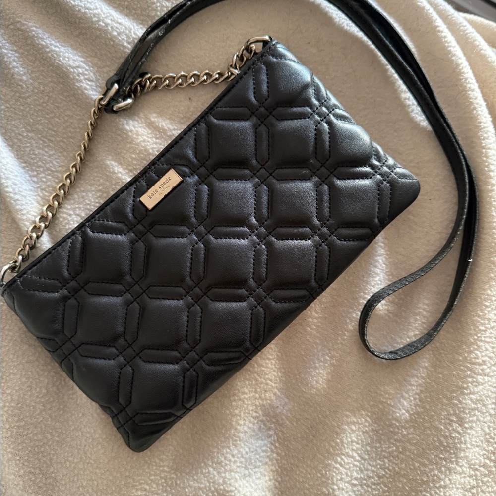Kate Spade leather crossbody with gold hardware.